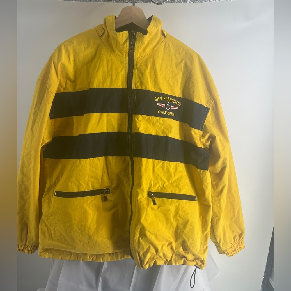 Yellow and black San Francisco rain jacket